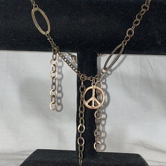 Boho necklace with assorted chains and the peace sign - Picture 3 of 6